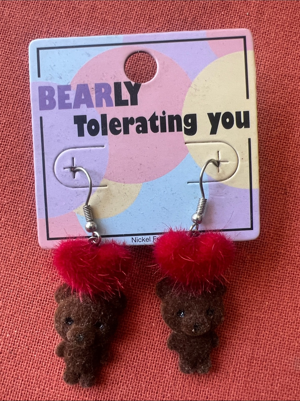 Spencer's Brown Teddy Earrings with Red Pom-Poms